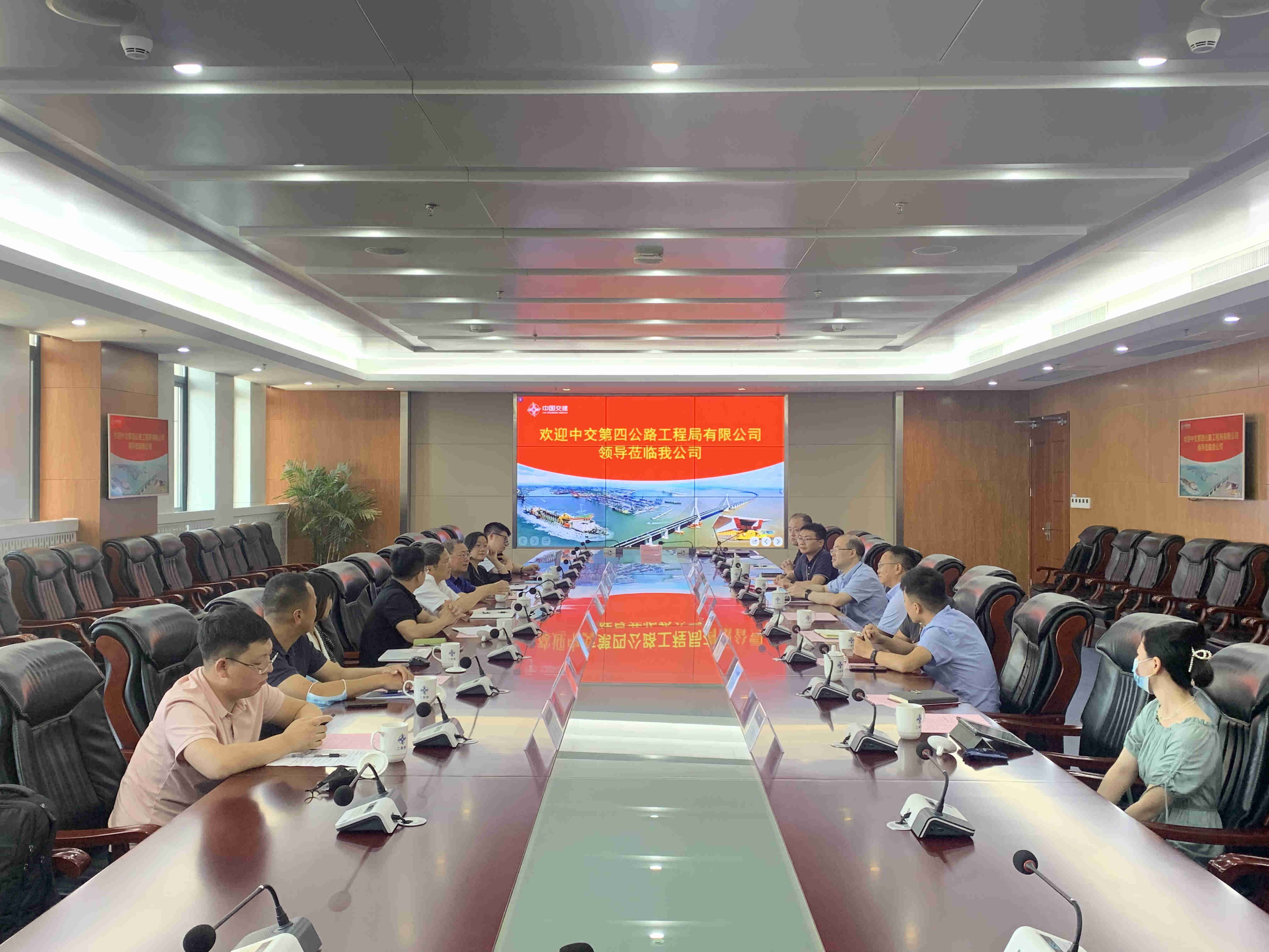 公司领导会见四公局副总经理王昕