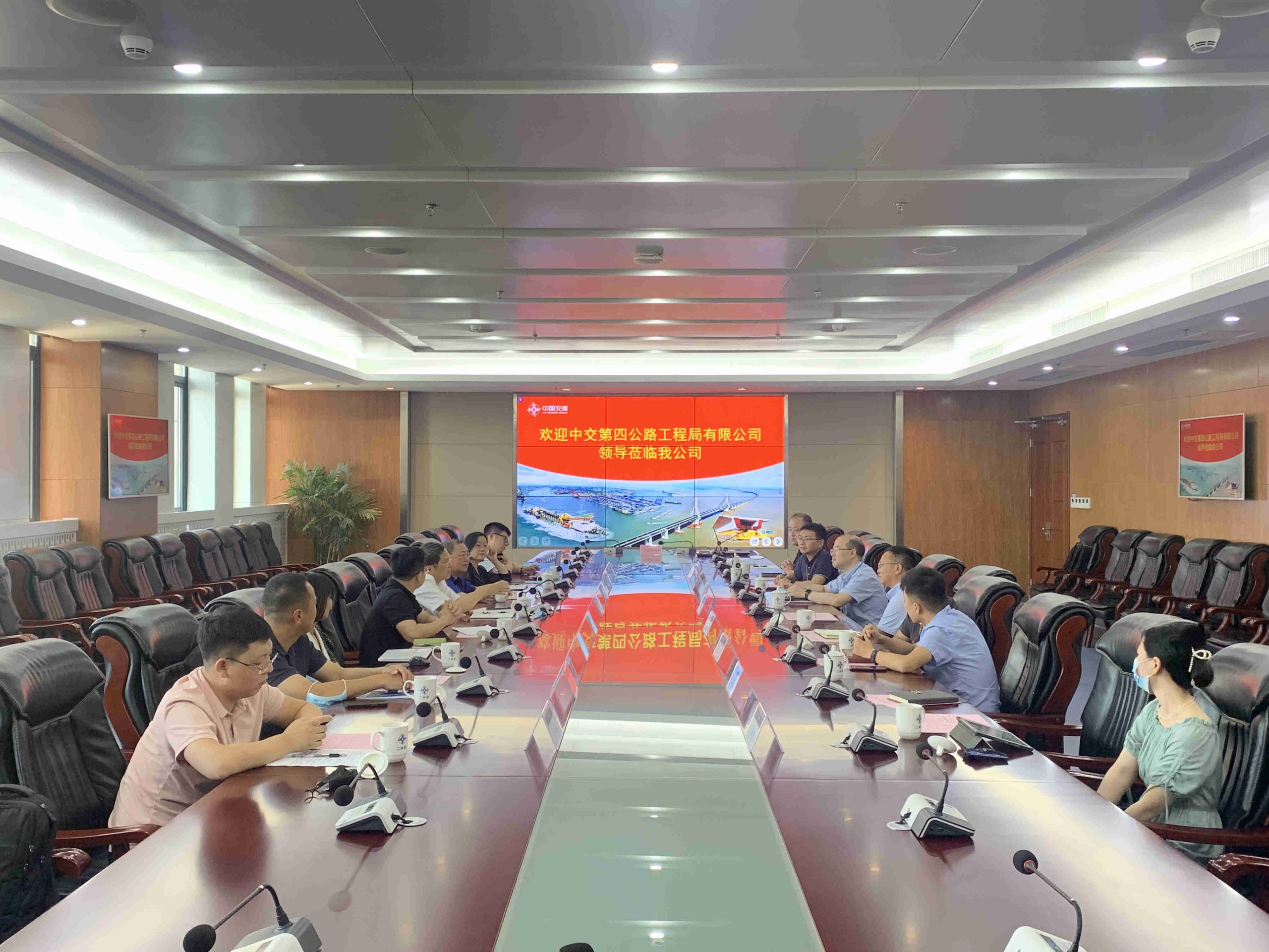 公司领导会见四公局副总经理王昕